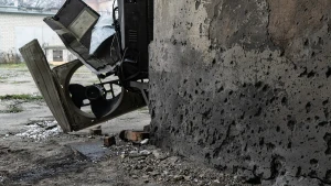 Наслідки обстрілів середмістя Херсона 