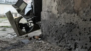 Наслідки обстрілів середмістя Херсона 