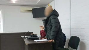 підозрювана