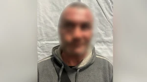 затриманий 